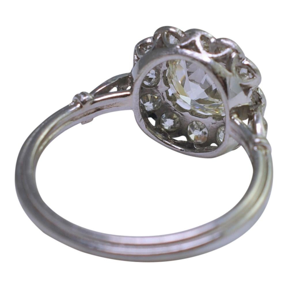 Art Deco Diamond Halo Platinum Engagement Ring For Sale 2