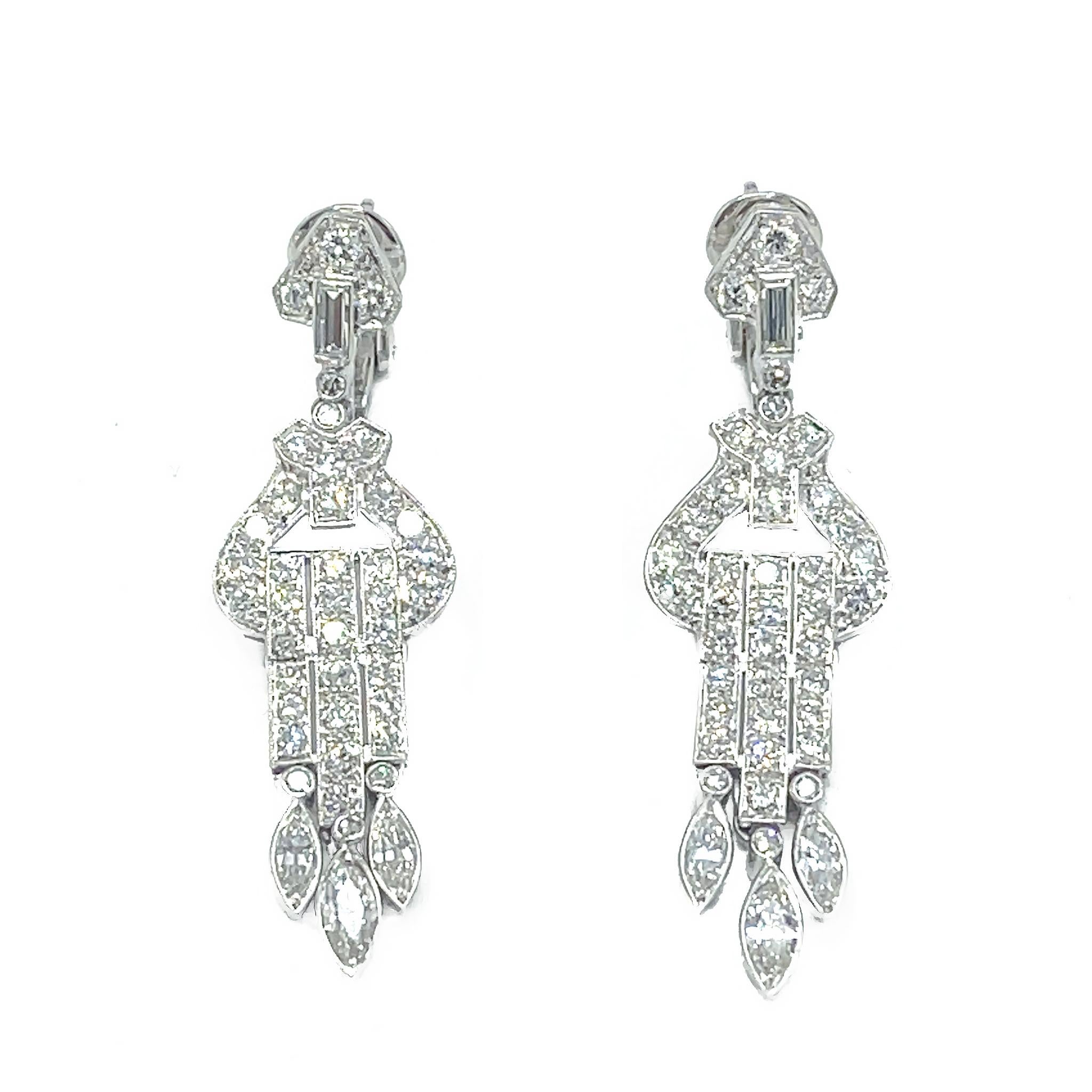 These magnificent hanging earrings create a seductive look and make you feel luxurious.  It's the perfect gift to mark a special occasion. 

Platinum
Diamond: 4.00 ct twd (estimated)
Length: 2 inches
Total Weight: 13 grams