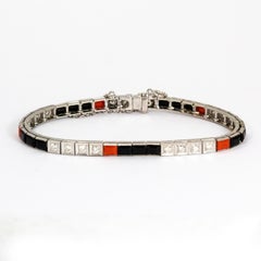 Art Deco Diamond, Onyx and Coral 18 Karat White Gold Tennis Bracelet