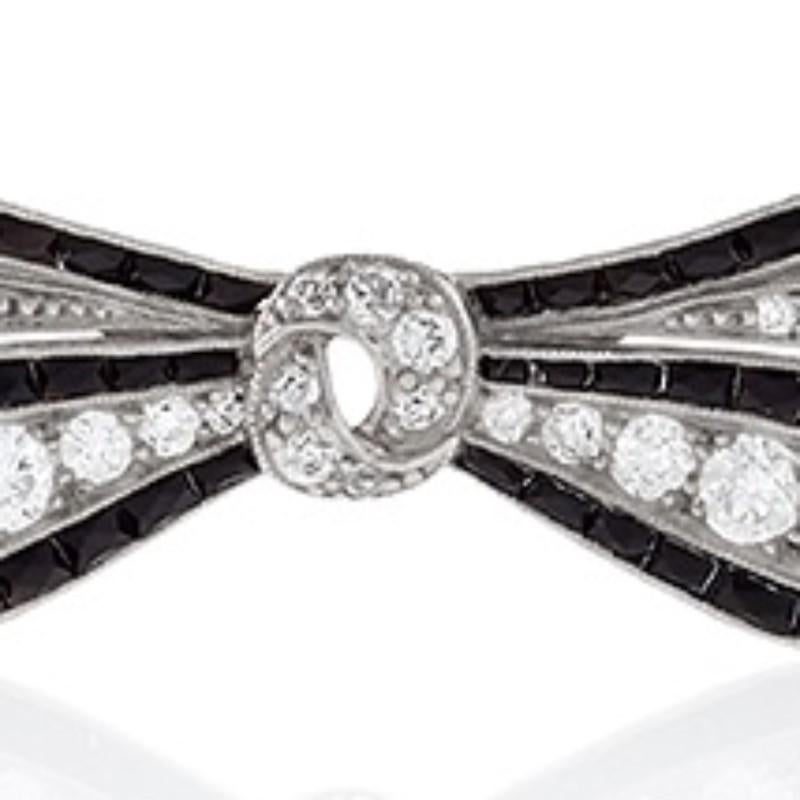 Old European Cut Art Deco Diamond Onyx and Platinum Bow Brooch For Sale