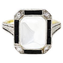 Bague blé Art déco en or jaune 18 carats avec diamants, onyx et pierre de lune surmontée de platine