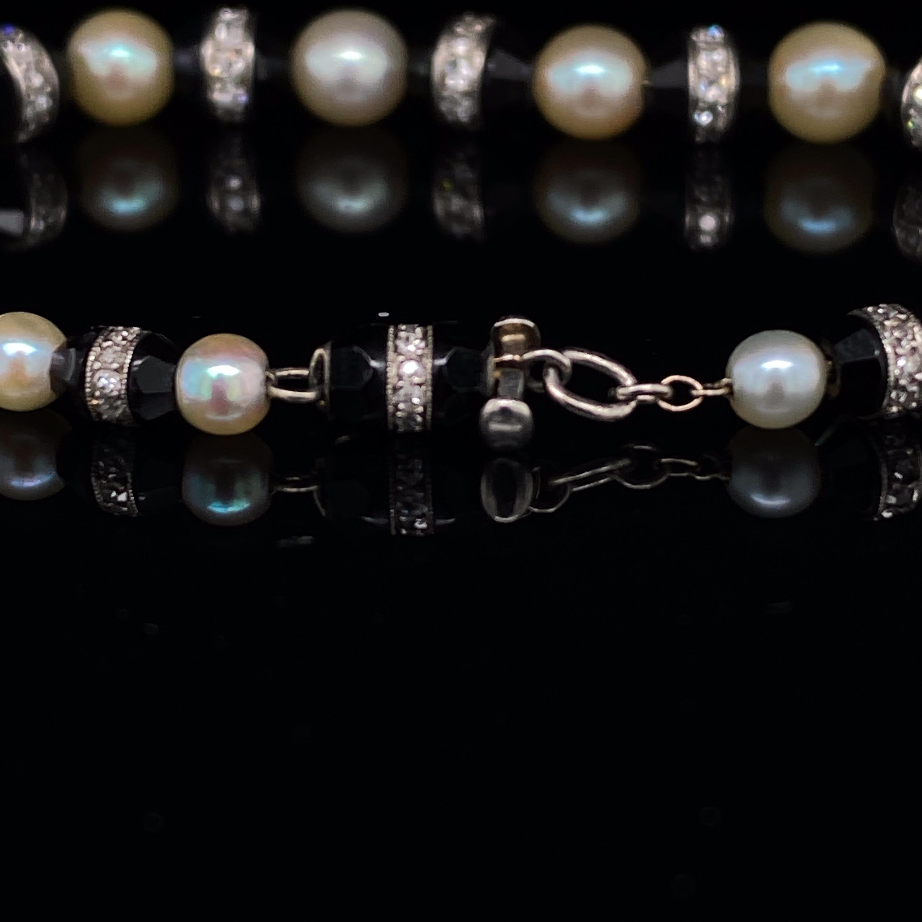 Old European Cut Art Deco Diamond, Pearl and Onyx Platinum Bracelet