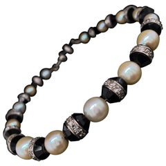 Platinarmband mit Diamanten, Perlen und Onyx im Art-déco-Stil