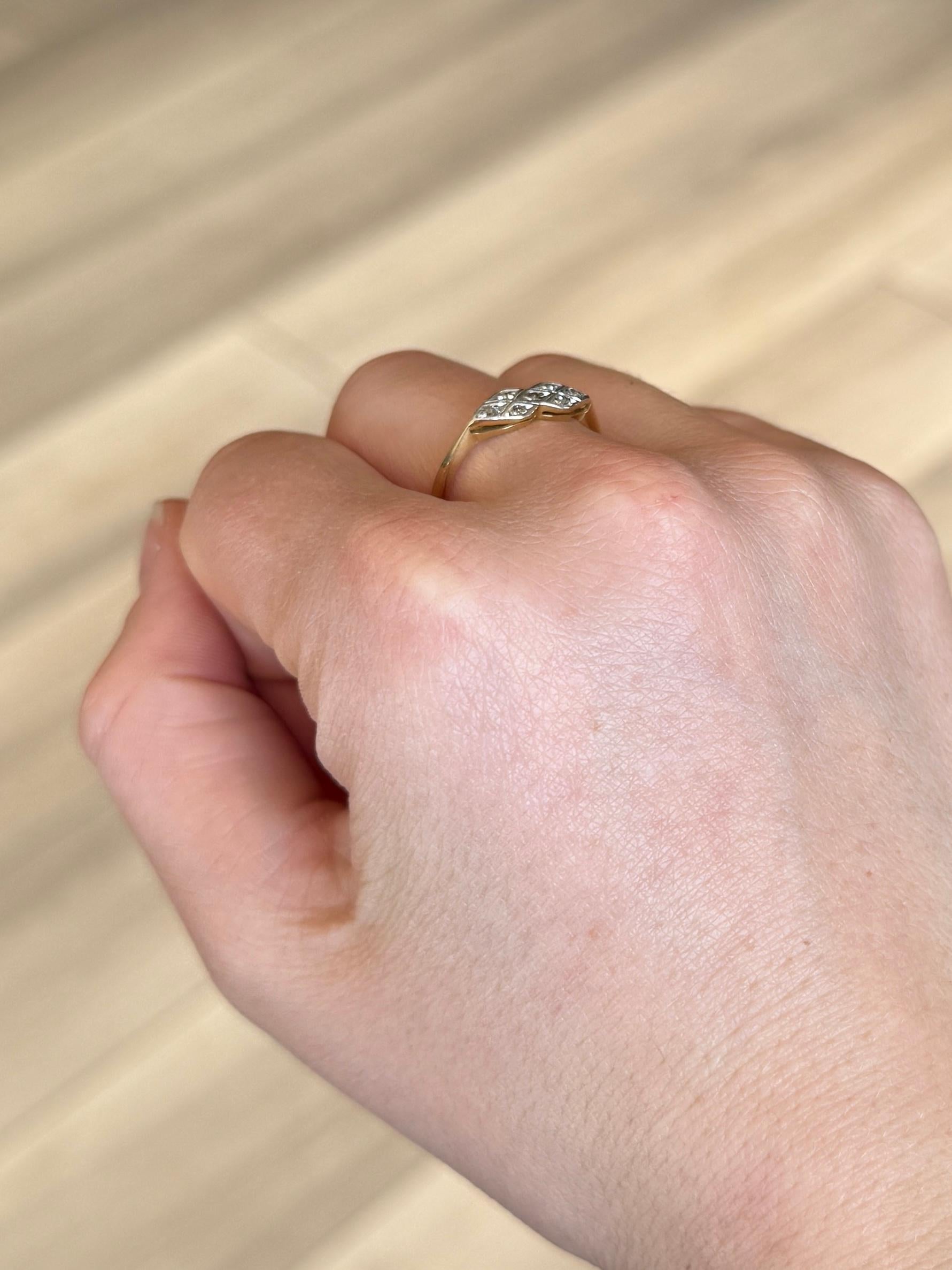 This gorgeous panel holds small but sparkly diamonds set in platinum and the rest of the ring is modelled in 18 carat gold. The stones total 14pts. 

Size: P 1/2 or 8 
Panel Dimension: 15x5mm

Weight: 2.5g

