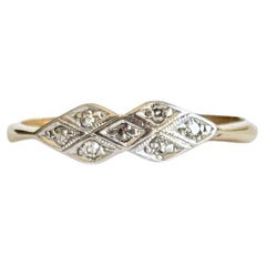 Bague grappe Art déco à panneaux en platine et or 18 carats