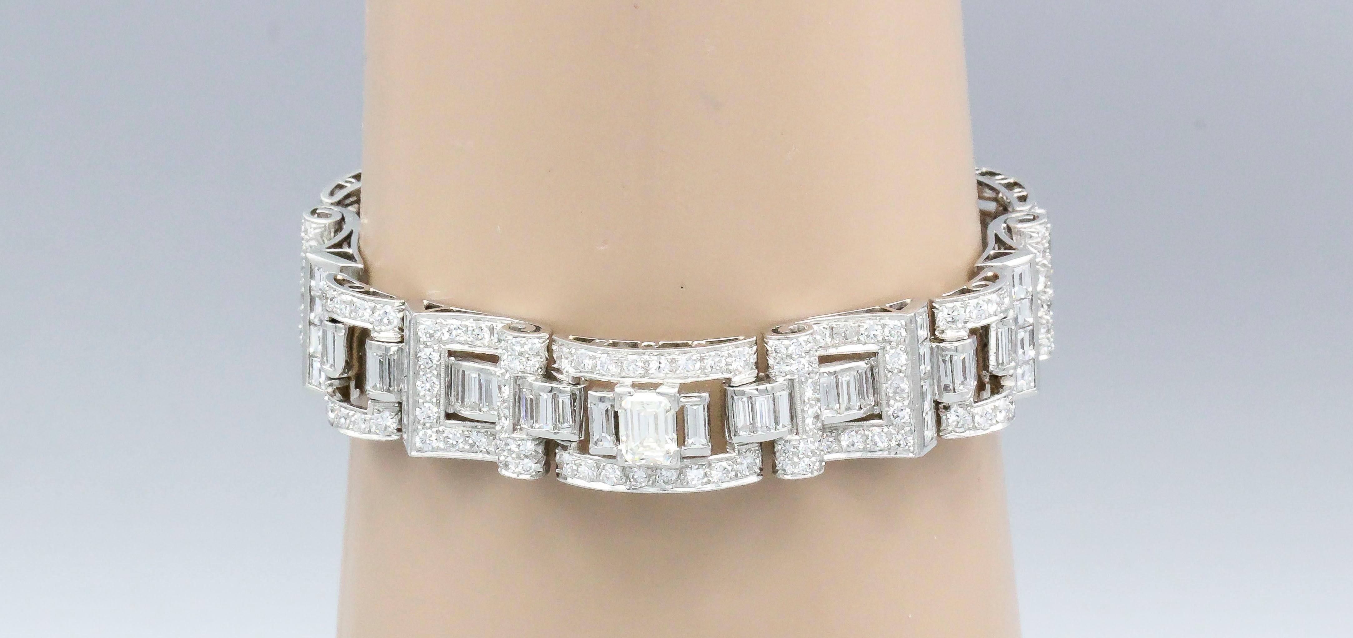 Very fine diamond and platinum bracelet, by Oscar Heyman, circa 1930s. It features high grade emerald cut diamonds, baguette cut diamonds, and round cut diamonds, of approx. 16.0cts total diamond weight. With letter from Oscar Heyman
Hallmarks: .90
