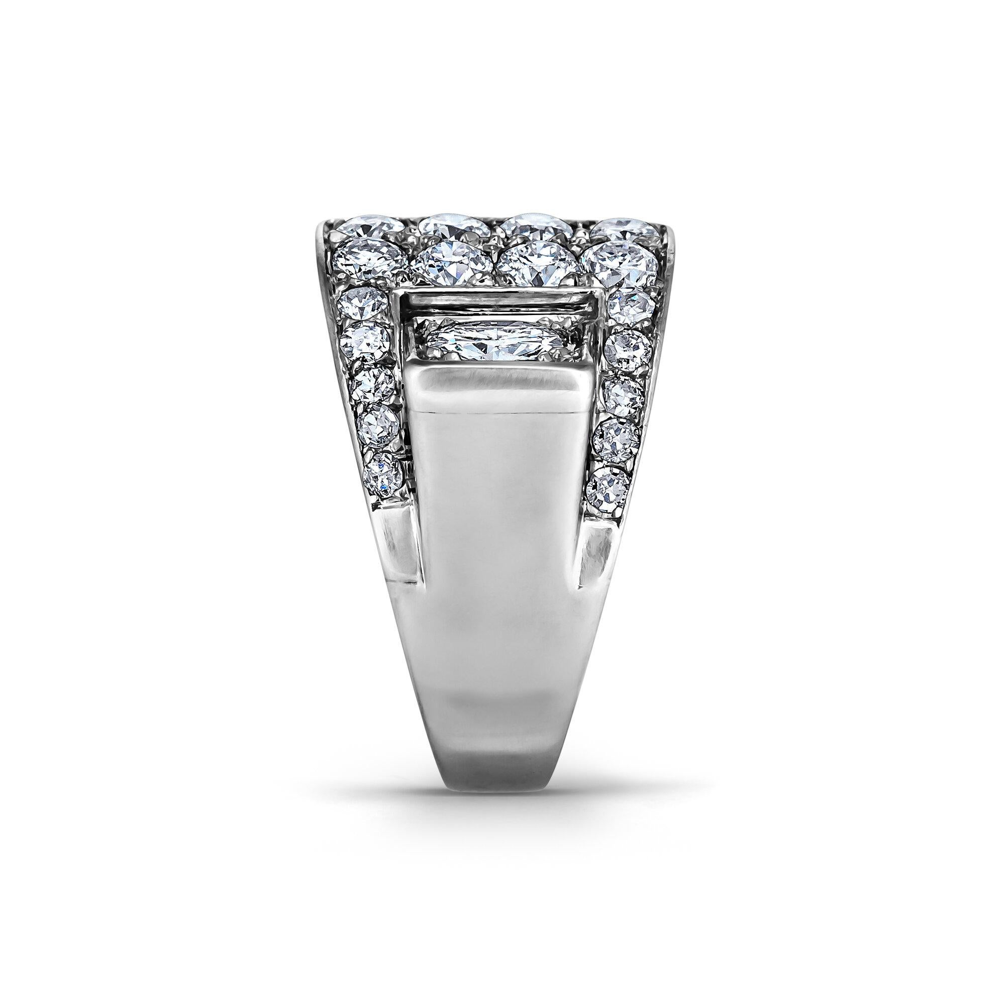 Looking striking from every angle, this Art Deco diamond platinum ring will keep you buckled up.  With a total of approximately two carats of fiery diamonds, this one-of-a-kind buckle style ring is beautifully handcrafted and visually spectacular. 