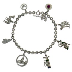 Bracciale Charm Art Deco in platino con diamante, pietre e smalto