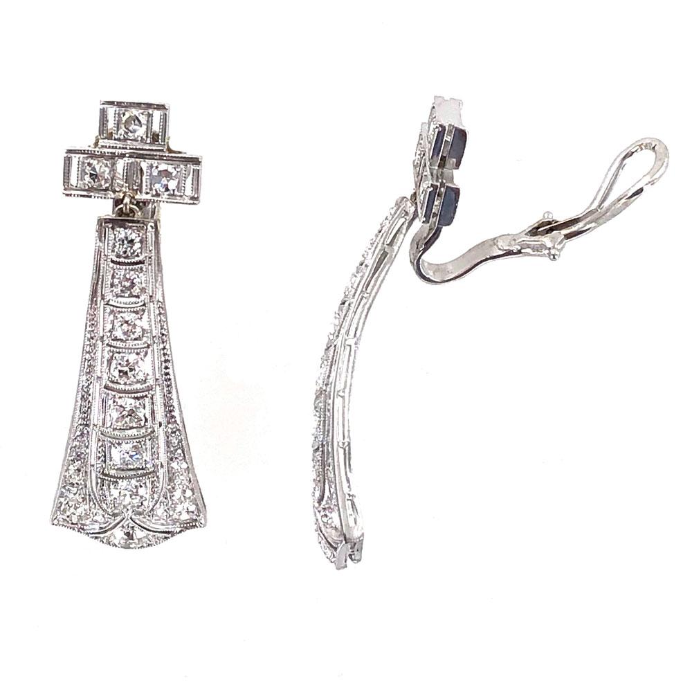 Stunning original Art Deco diamond drop earrings hand crafted in platinum. These earrings feature 54 Old European Cut Diamonds that equal approximately 2.00 carat total weight. The earrings measure 1.5 inches in length and .50 inches in width.