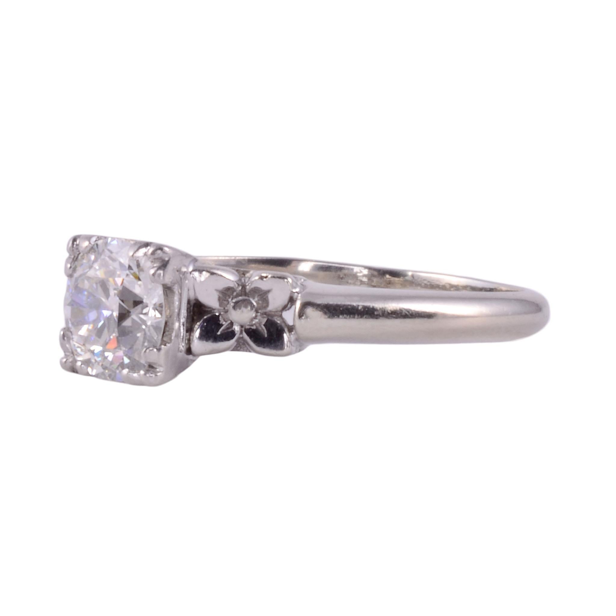 Antique Art Deco diamond 14KW engagement ring, circa 1920. This 14 karat white gold ring features a bead set .67 carat center old European cut diamond. This diamond has VS2 clarity and K color. It is accented with .05 carat total weight of old