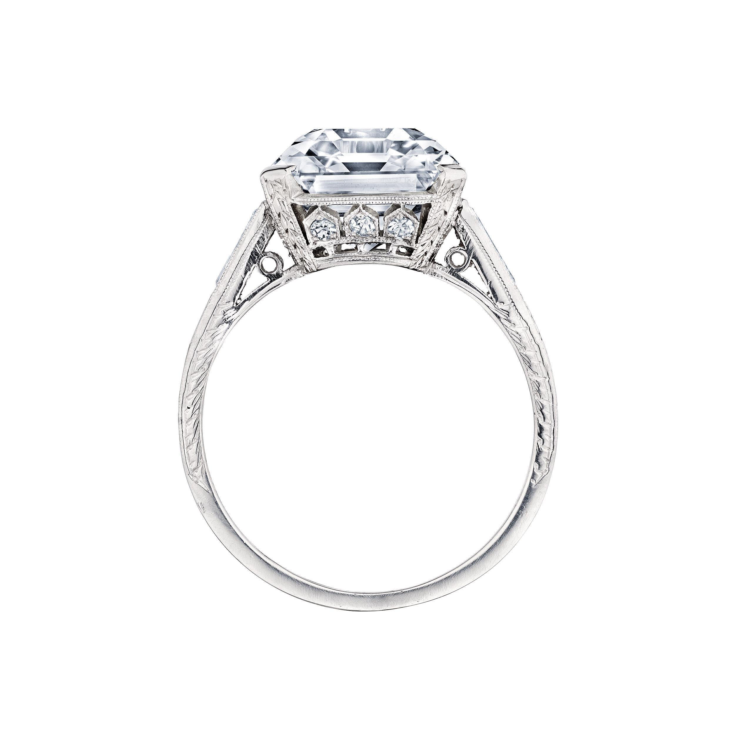Tour de force.  With an original platinum Art Deco mounting and 7.53 carat emerald cut diamond, this spectacular engagement ring is all about strength of style.  Diamond color I.  Clarity VVS2.  GIA certification #2221632349.  Size 7 1/4.  Can be
