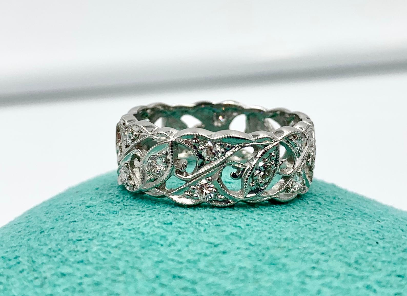 An Antique Art Deco Diamond Platinum Eternity Band Wedding Engagement Stacking Ring.  This original Art Deco ring is absolutely stunning.  It has 18 spectacular Round Brilliant Cut Diamonds which are beautifully set in the Platinum open work band
