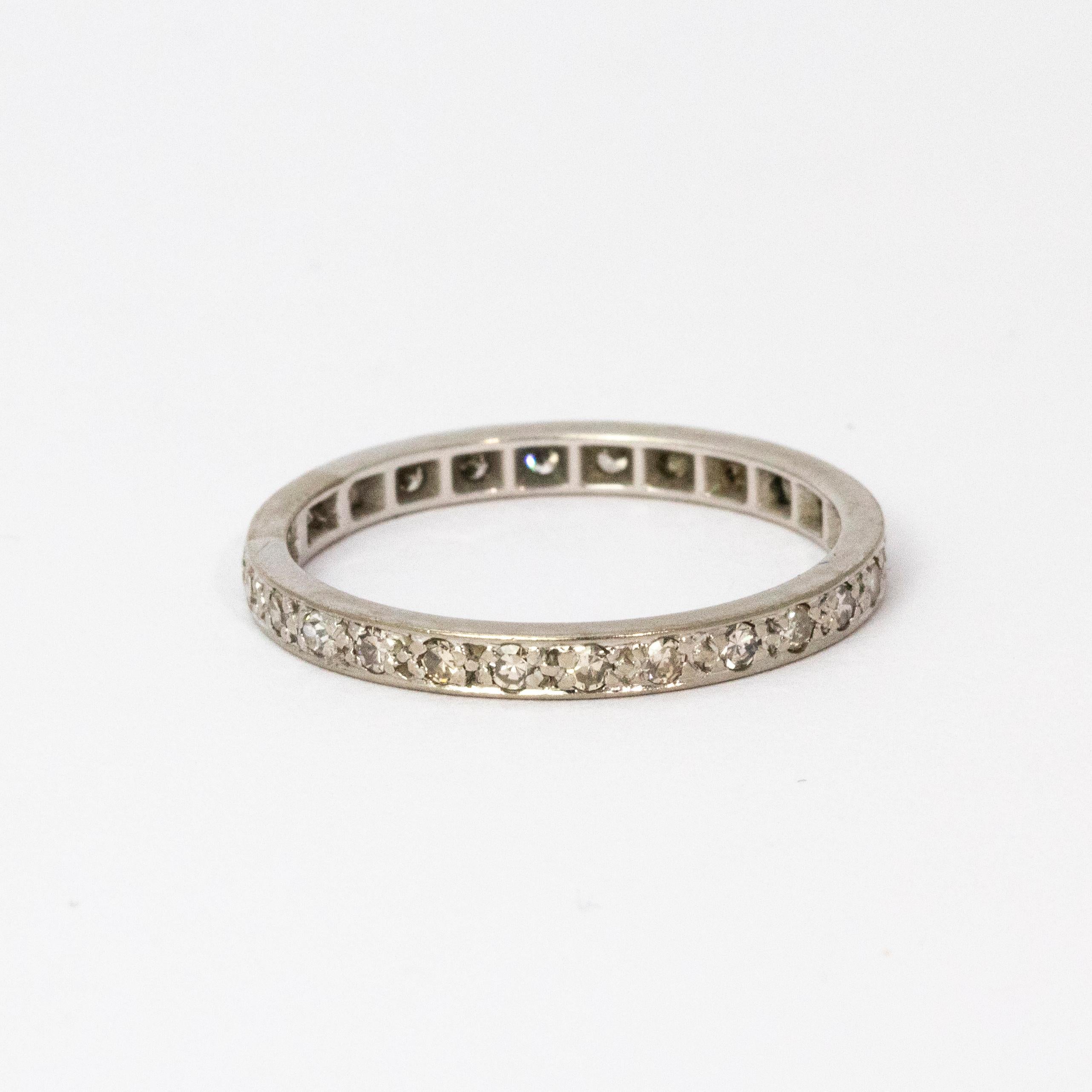 A superb Art Deco full eternity band set with beautiful white diamonds and modelled in platinum.

Ring Size: P 1/2 or 8