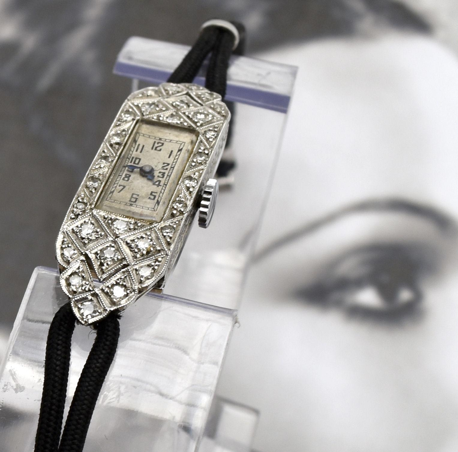 For your consideration is this beautiful ladies platinum and white gold, diamond set, Art Deco wrist watch which comes with what is believed to be it's original case. A beautiful watch in original condition, no repairs anywhere, and retains its
