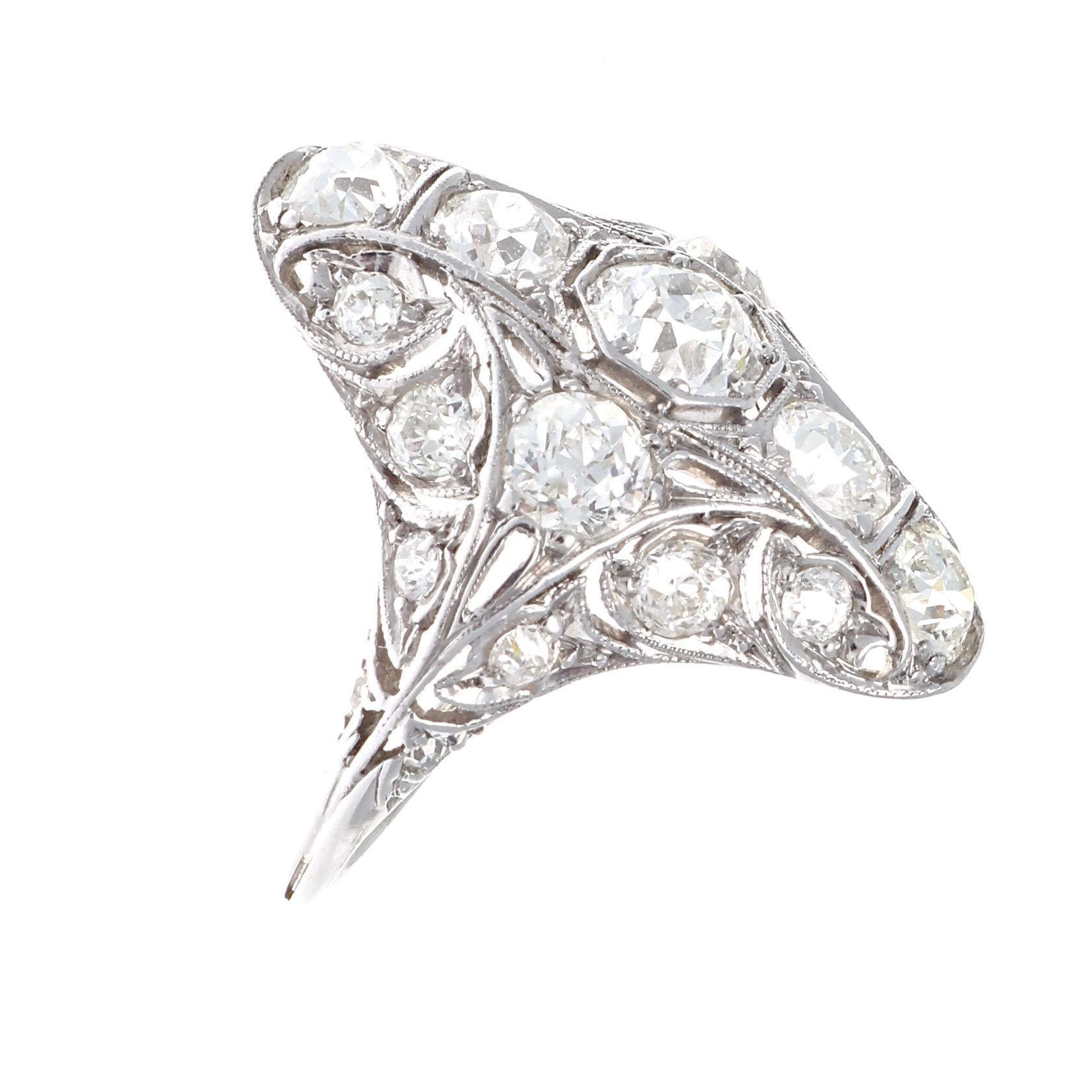 When you want a statement ring that is bold yet elegant, this Edwardian navette ring is the perfect choice. Set in platinum and containing approximately 3.50 carats of G-H color, VS-SI old European cut lively diamonds. This exquisitely crafted ring
