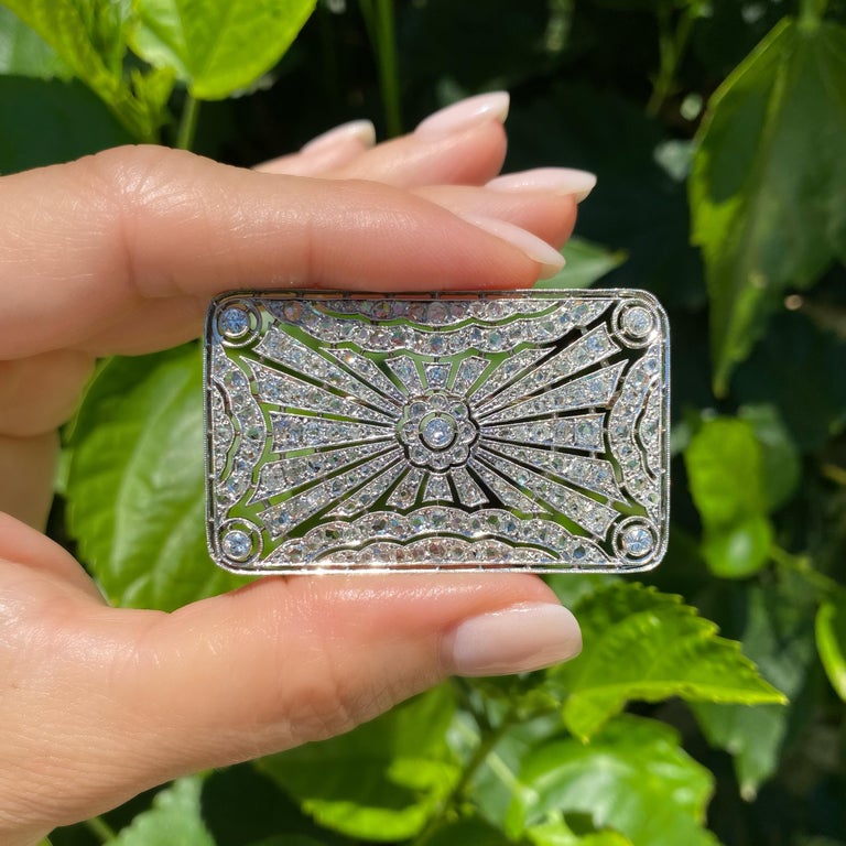 Simply Beautiful and finely detailed Art Deco Diamond Rectangular Platinum Brooch. Beautifully Hand crafted in Platinum and Hand set with Diamonds approx. 2.50 total Carat weight. Measuring approx. 2.08” long x 0.27” wide x 1.28” high.  The Brooch