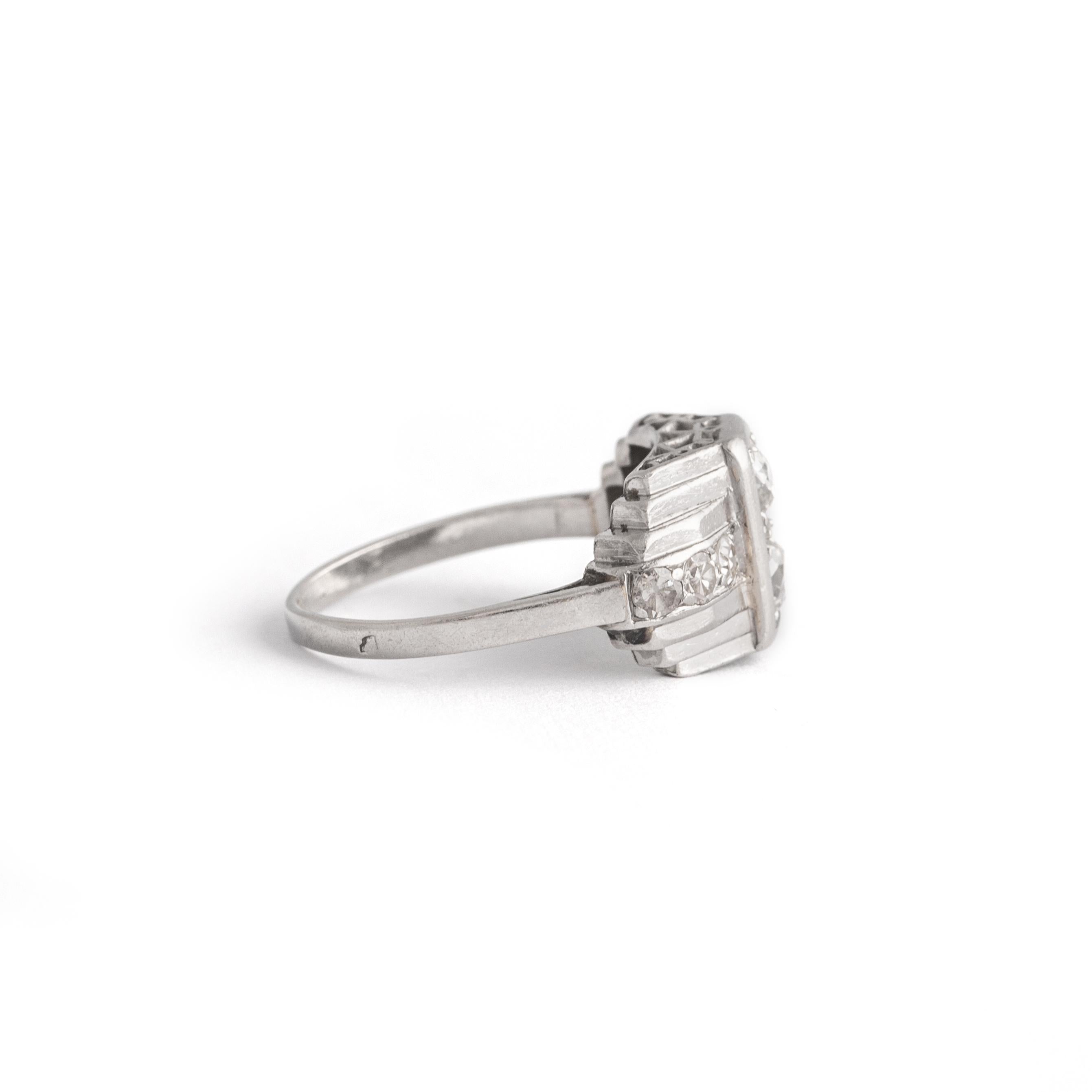 Art Deco Diamond Platinum Ring.
Old mine cut Diamond. Circa 1925. 
Size: 5.25 US.
Total gross weight: 4.66 grams.