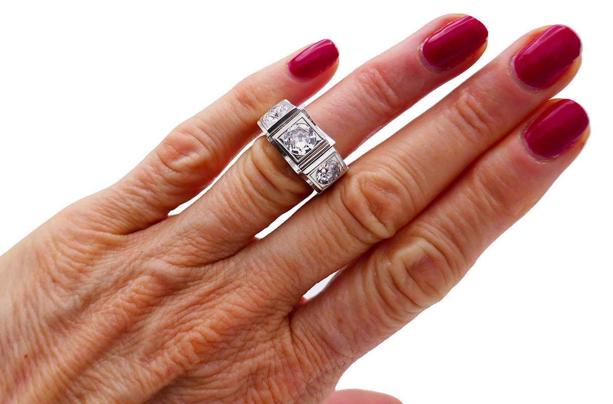 Stunning diamond ring made of platinum and featuring three Old European cut diamonds. The center diamond is approximately 1.20-carat, I color, VS1 clarity, the side diamonds are 0.90-carat and 0.80-carat, J color, SI1 clarity; diamond  total weight