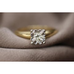 Art Deco Diamond ring. 14k Yellow and White Gold Square table.