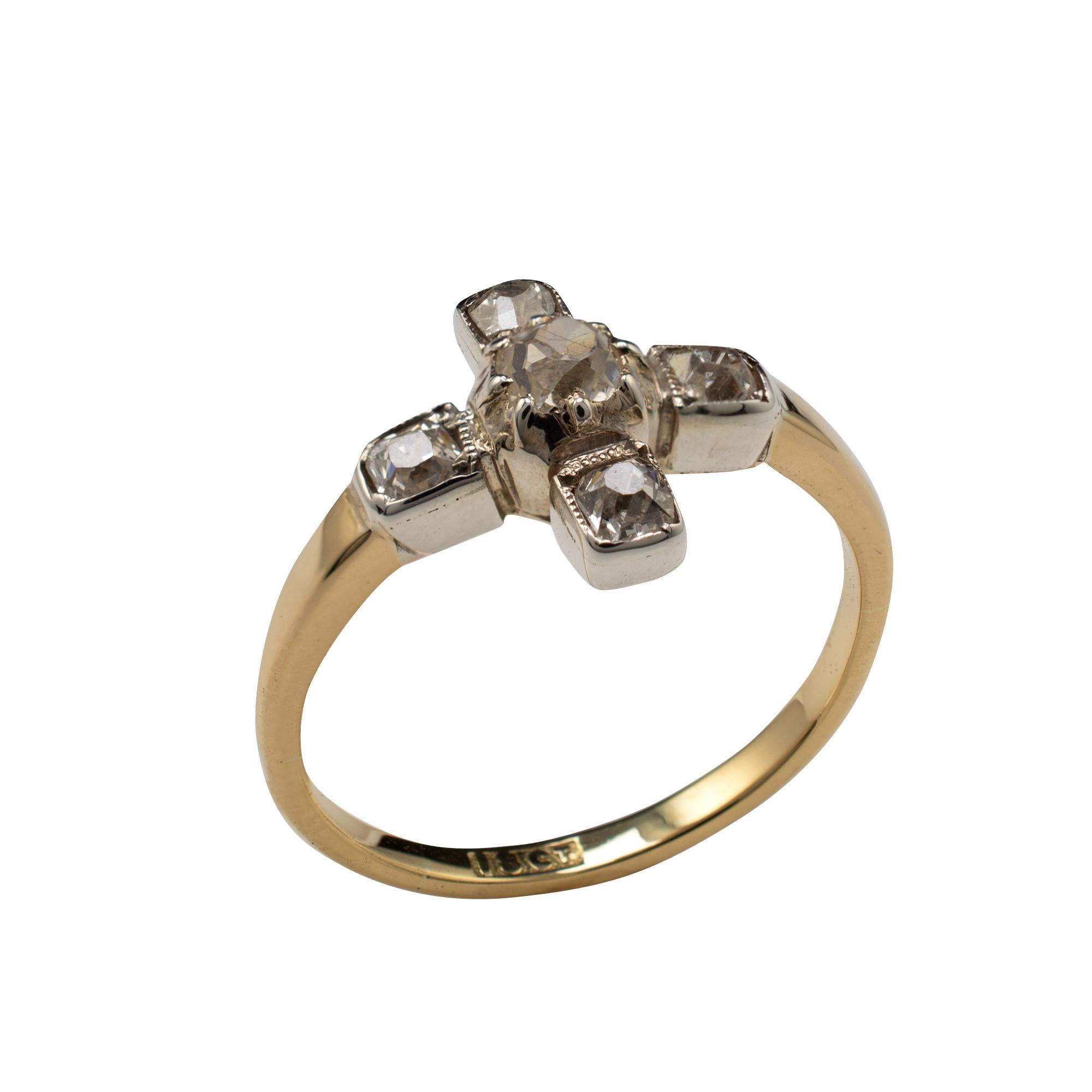 This Art Deco diamond ring, crafted in 18 karat gold, is presented in lovely condition with fabulous quality old cut diamonds. 

The white gold setting displays a claw set 0.18-carat old cut diamond to the center with 4 smaller old cut diamonds, set