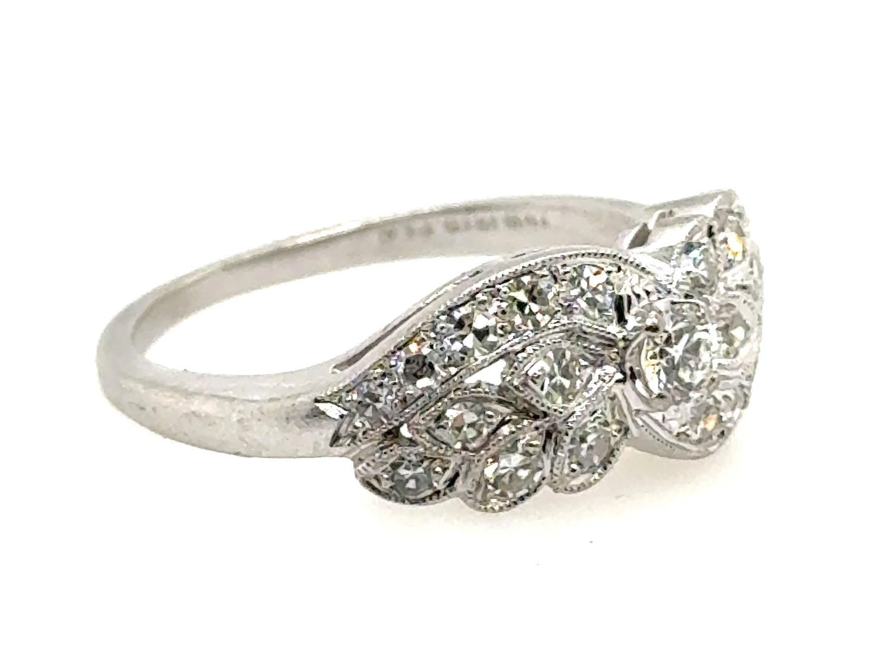Genuine Original Art Deco Antique from 1930's Vintage .75ct Round Old European Cut/Single Cuts Motif Vine Ring Platinum 


Features a Captivating  .15 carat Round Old European Cut Diamond as its Centerpiece 

Center Diamond is Surrounded by 20
