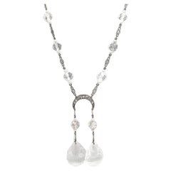 Collier Art Déco en diamant, cristal de roche, bouddha et perle en or blanc circa 1920