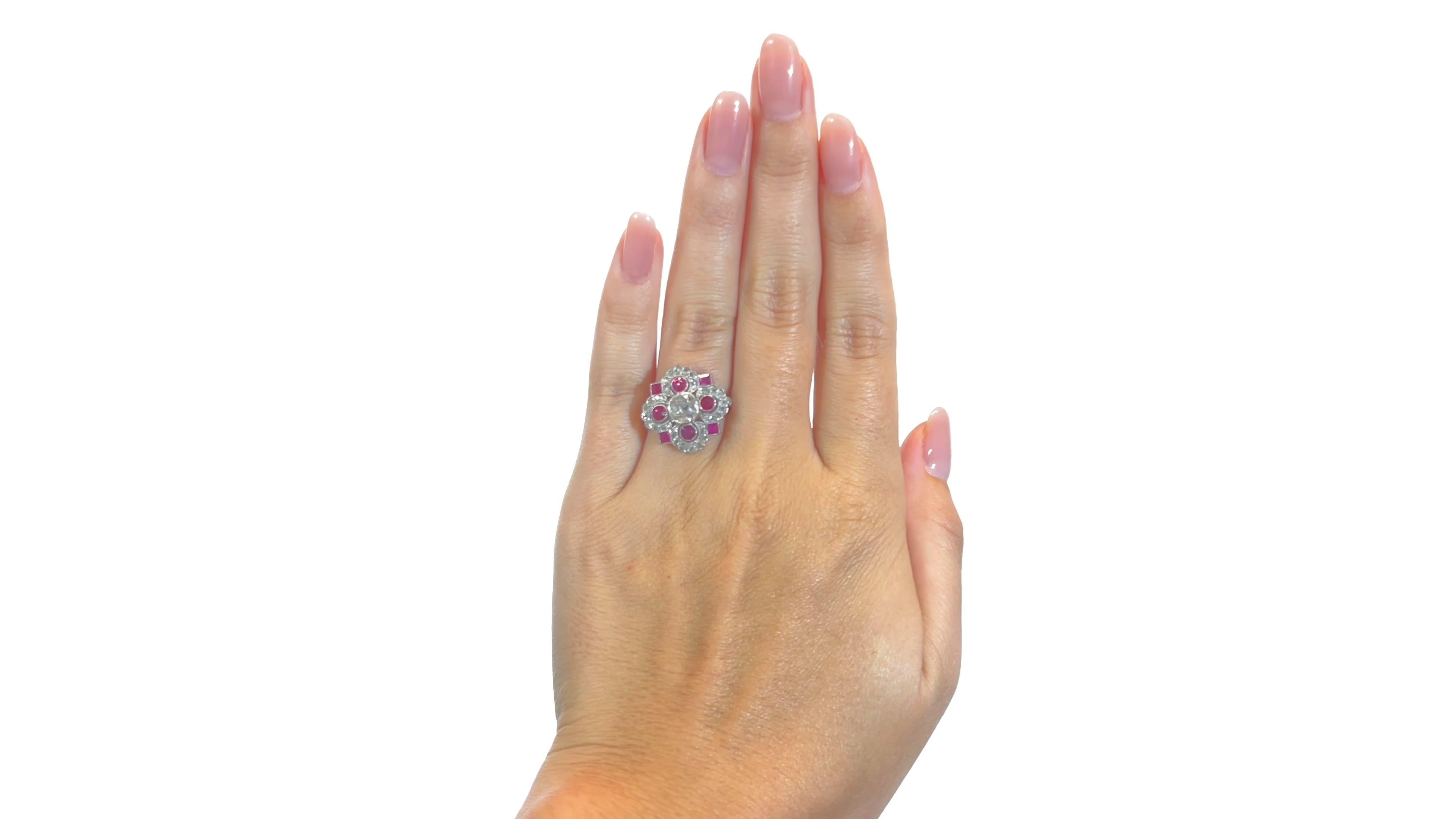 One Art Deco Diamond Ruby 18 Karat Yellow Gold Ring.  Featuring one old mine cut diamond weighing approximately 0.74 carat, graded G-H color, SI clarity. Accented by 28 rose cut diamonds with a total weight of approximately 0.70 carats, four round