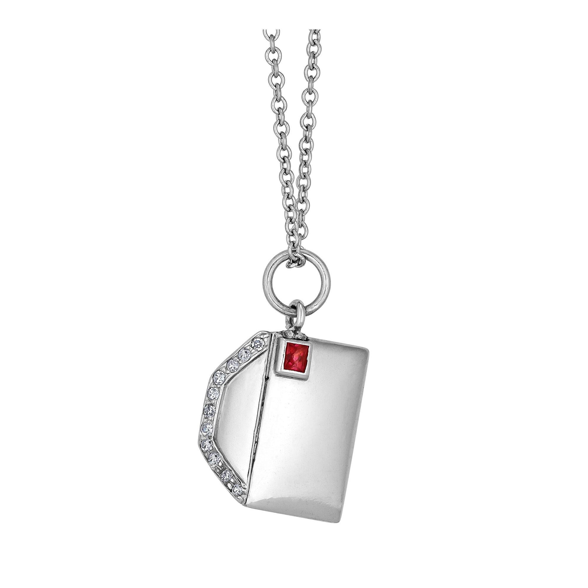 Seal your affection eternally with this enchanting Art Deco platinum and ruby love letter charm pendant.  With a luscious ruby stamp and a diamond accented back envelope flap, this romantic letter opens to reveal your heart.  Total diamond weight is