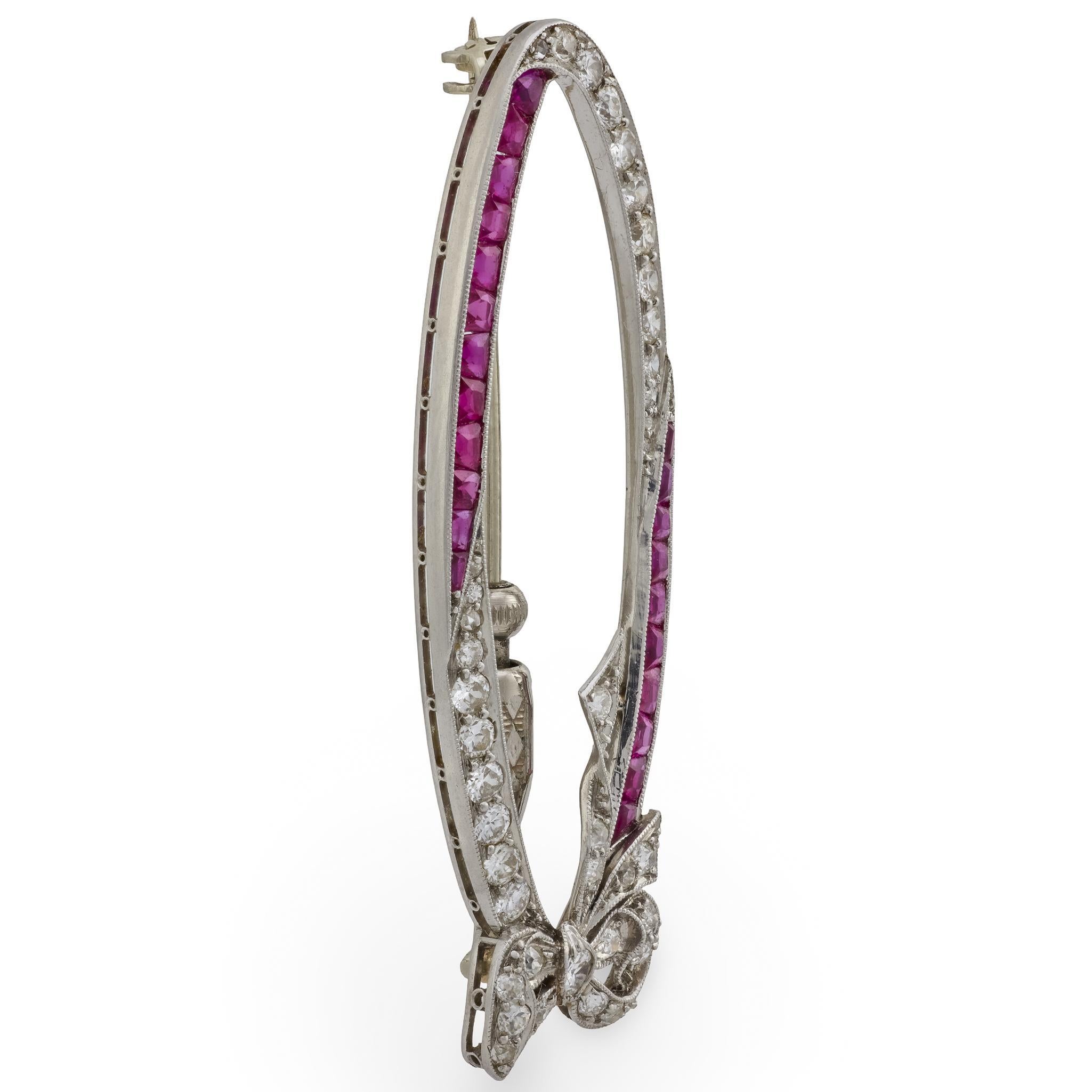 Women's Art Deco diamond ruby platinum oval bow brooch For Sale