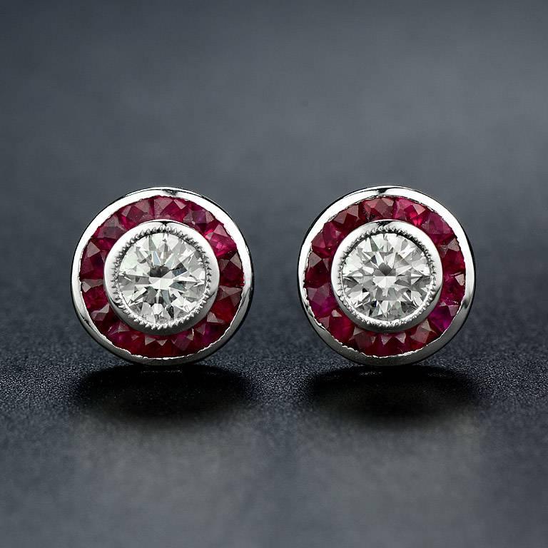 Pendant & Stud Earrings (Selling as a set)

#Pendant
Set with 0.52 Carat Weight Diamond G Color VS Clarity in the center. Surrounded by halo of French Cut Ruby 16 pcs. 0.50 Carat. And 2 small Diamonds weight 0.02 carat on the bail. Dimension is 9 x