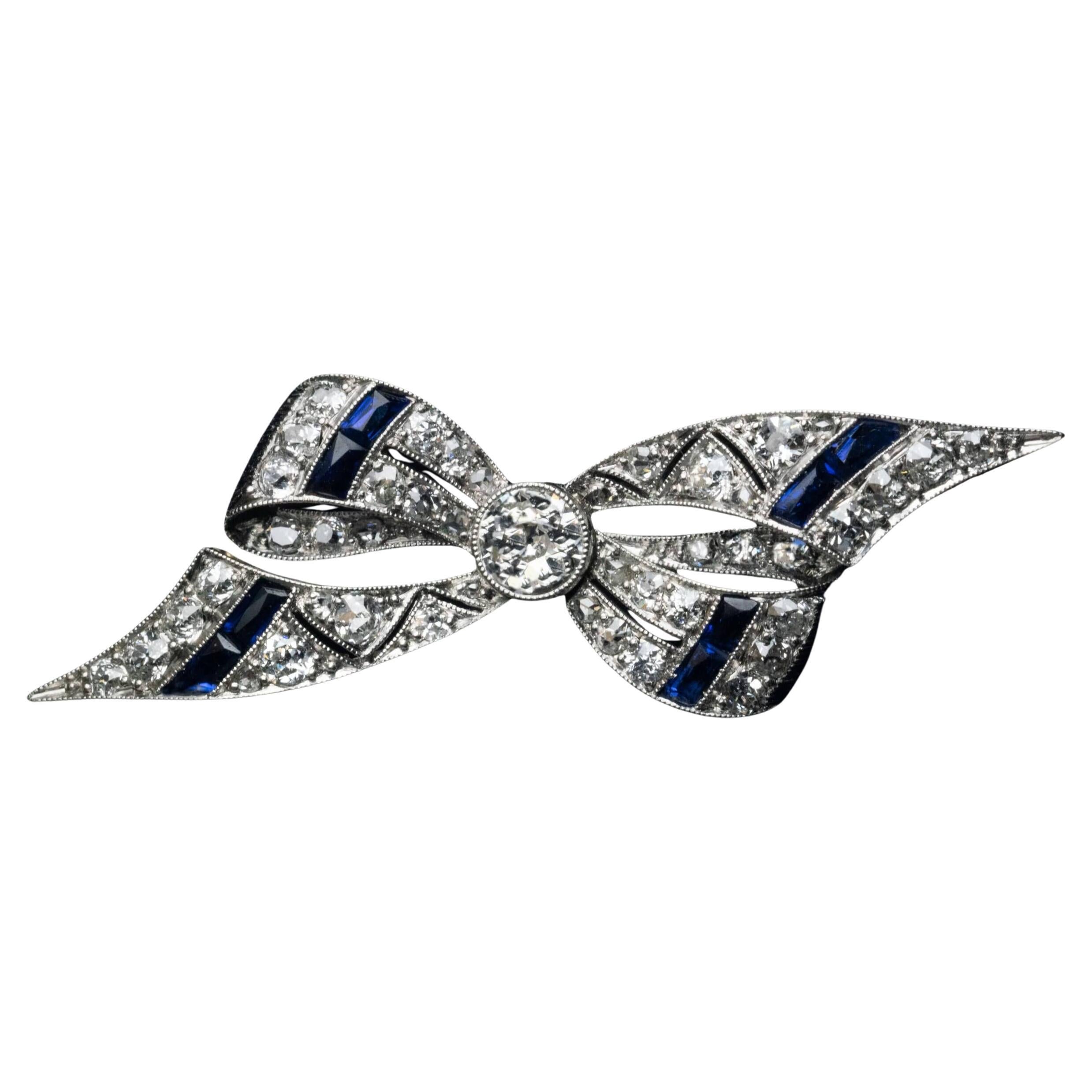 Broche nœud antique Art déco en diamants et saphirs Réf. : 548750