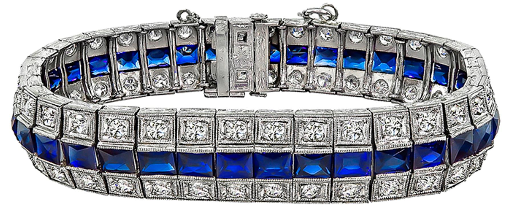 This stunning platinum bracelet from the Art Deco era, is set with sparkling old mine cut diamonds that weigh approximately 3.00ct. graded G-H color with VS1 clarity. The diamonds are accentuated by lovely French cut sapphire accents. The bracelet