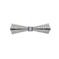 Art Deco Diamond Sapphire Platinum Bow Pin Brooch