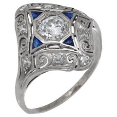 Art Deco diamond sapphire platinum filigree shield ring