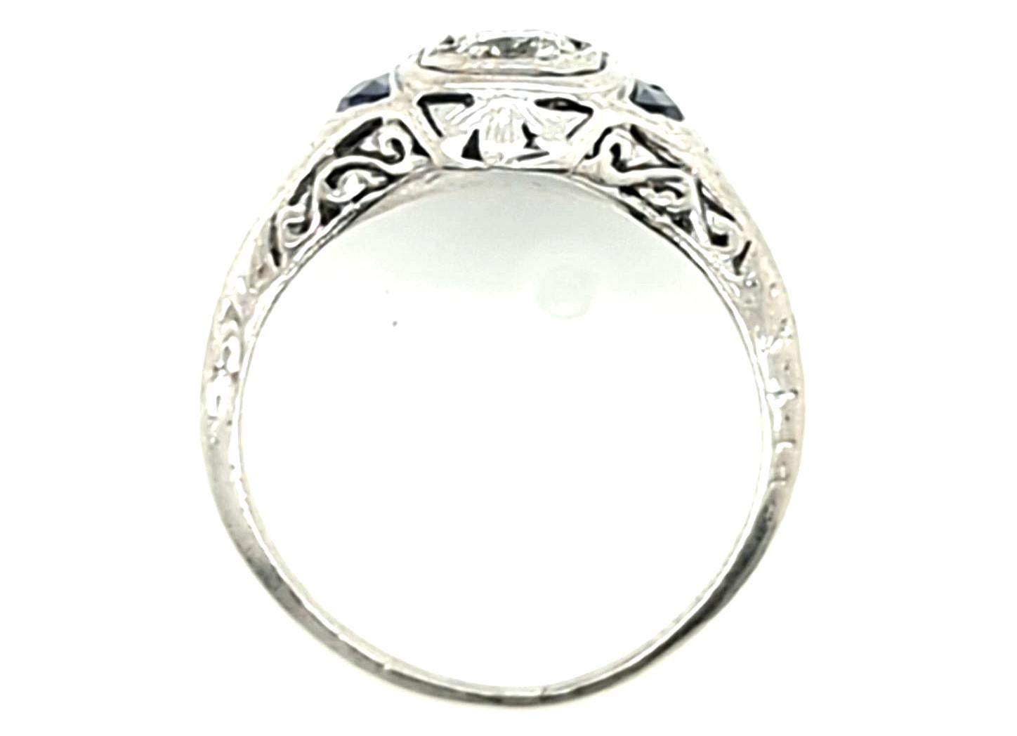 Genuine Original Art Deco Antique from 1930's Diamond & Custom Cut Sapphire Ring .25ct  Platinum 


Featuring a Stunning .25ct H-I/VS Genuine Round Brilliant Cut Natural Mined Diamond Center

Surrounded by Custom Cut Sapphires 

Engraved