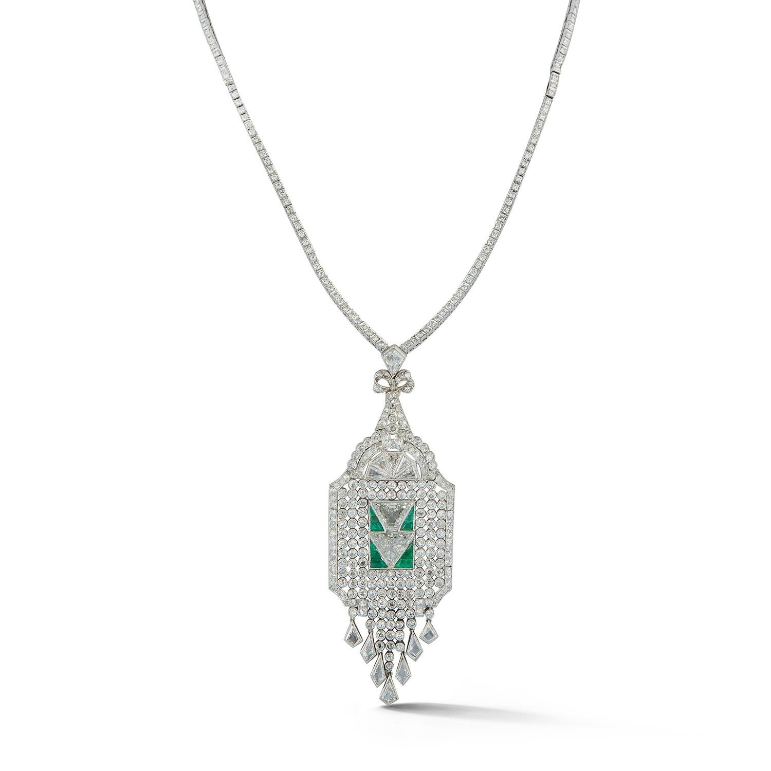 Art Deco Diamond Sautoir Necklace
Approx 12 ct diamonds
Accented with emeralds
Pendant detachable
23.5 inches approx length with pendant