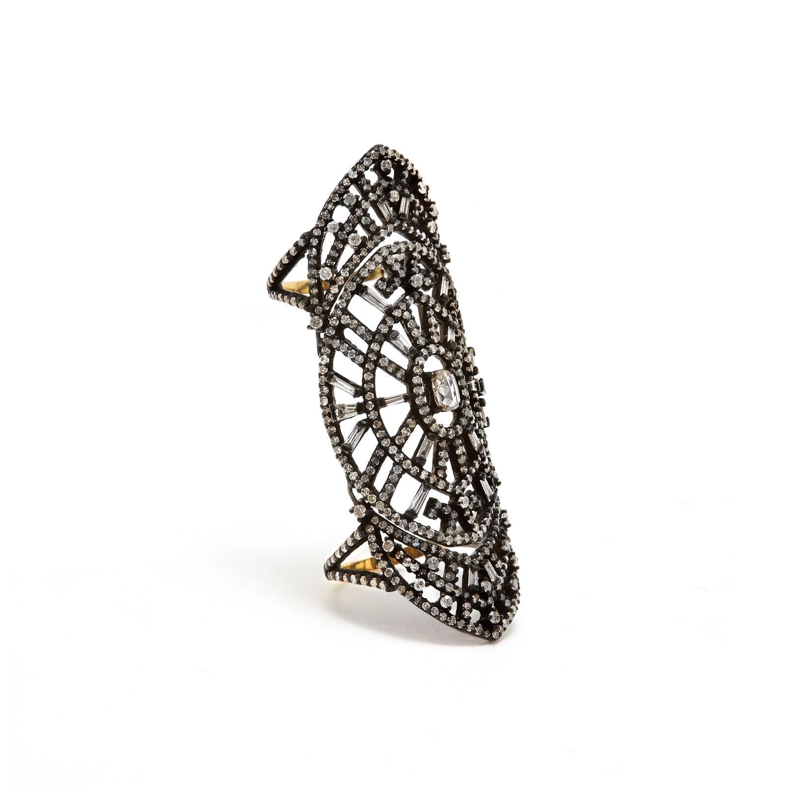 Inspired by the iconic Art Deco Era in jewelry... Stunning Diamond Baguettes and Rose Cut Diamonds in a hinged shield ring design. Set in Blackened Silver with Gold bands.

- Natural Diamond Baguettes and Rose Cut Diamonds weight approx 2.74
