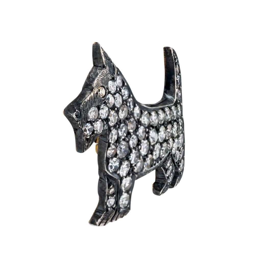Art Deco diamond silver and gold Scottie dog brooch circa 1930.  Clear and concise information you want to know is listed below.  Contact us right away if you have additional questions.  We are here to connect you with beautiful and affordable