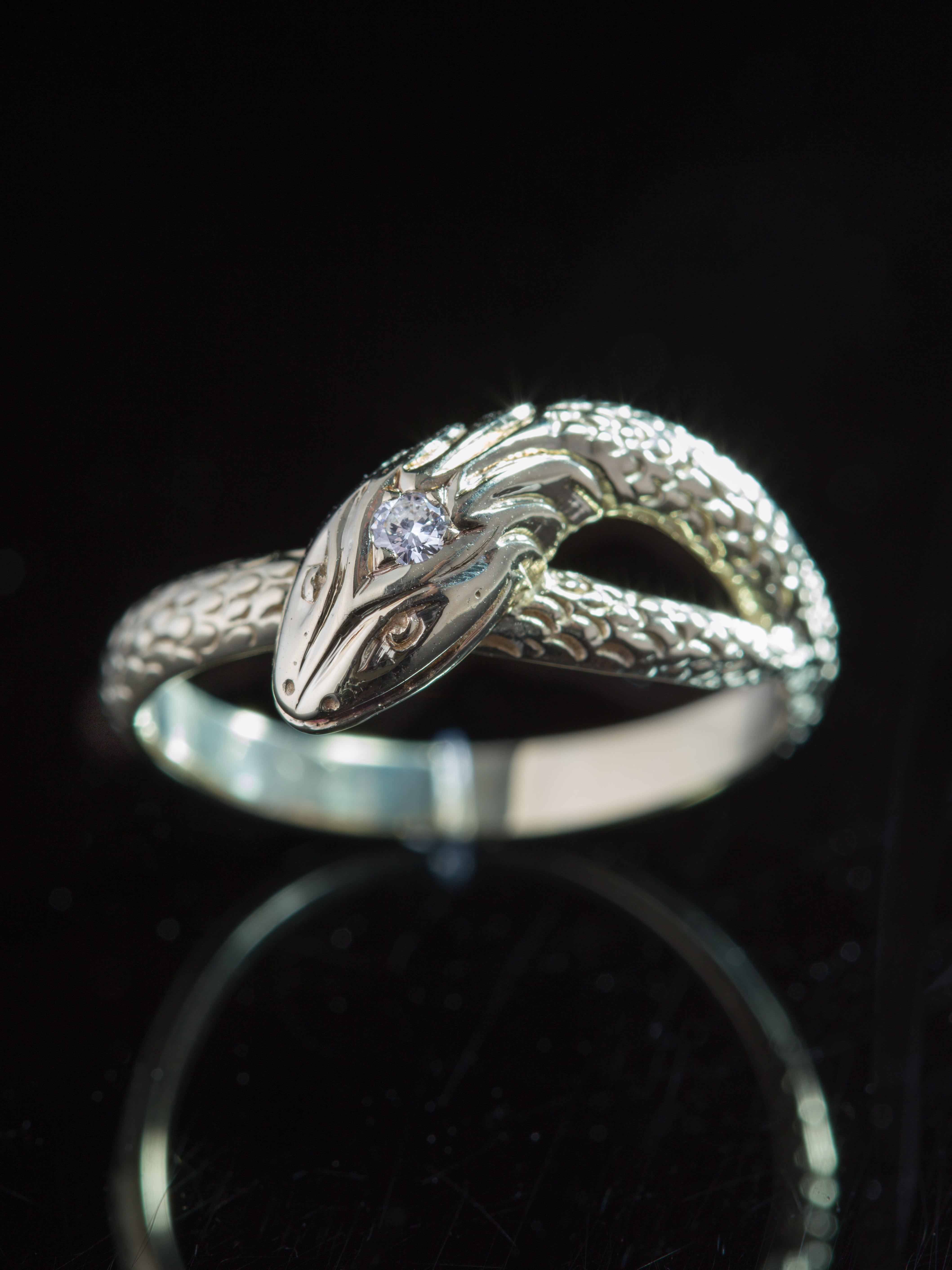 Snake symbolism has pervaded the annals of jewelry history. From power to regeneration, from eternity to wisdom, the image carries with it a presence like no other motif.
Art Deco decadence rears its sensual head with a snake motif ring with diamond