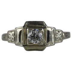 Art Deco Diamond Solitaire and 18K White Gold Engagement Ring