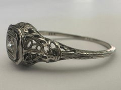 Art Deco Diamond Solitaire and Filigree Engagement Ring