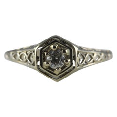 Bague de fiançailles Art déco solitaire et filigrane