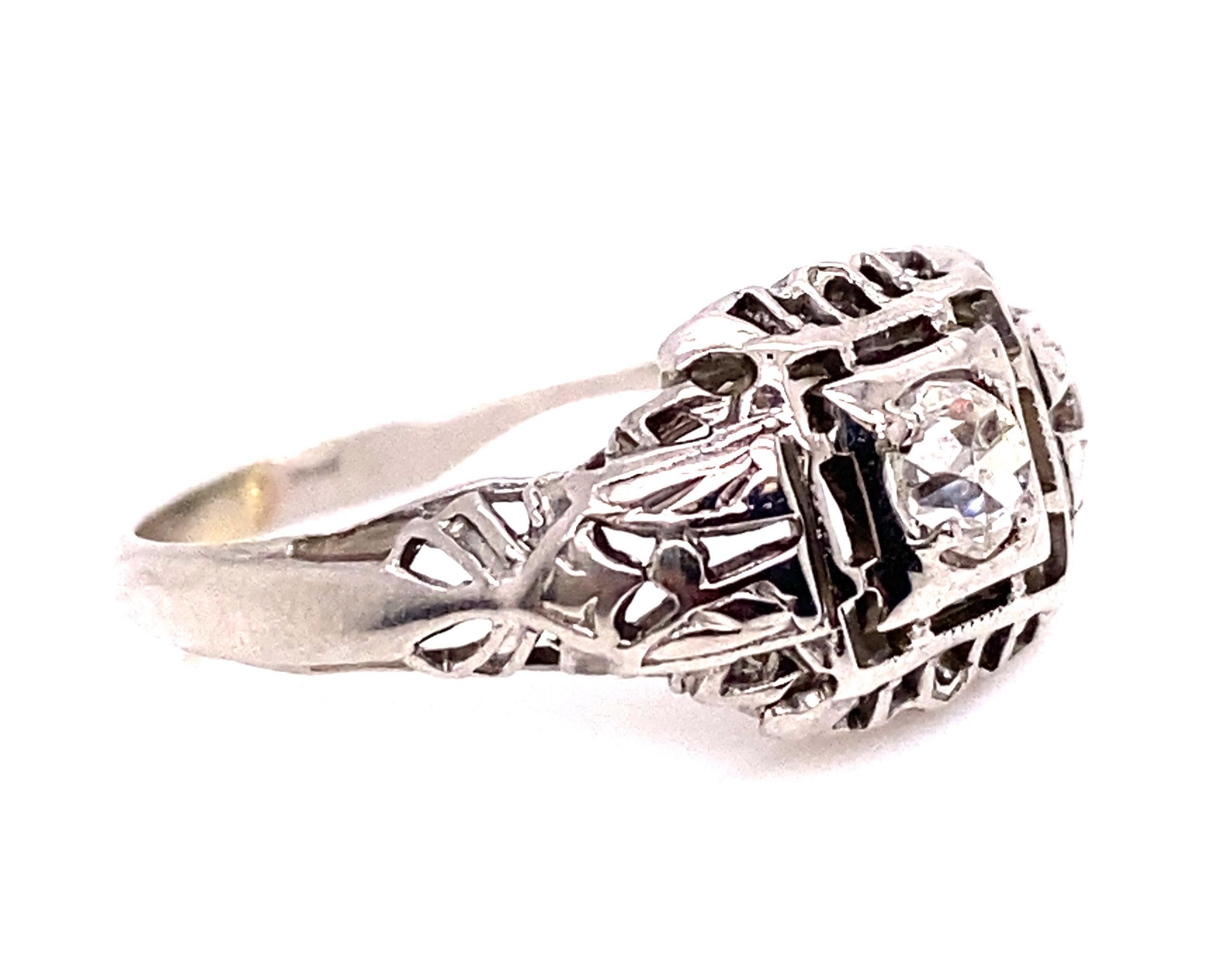 Genuine Original Antique from 1910's-1920's .18ct Diamond Solitaire Engagement Ring 18K White Gold Art Deco 



Featuring a .18ct Genuine Old Mine Cut Natural Mined Diamond Center

Spectacular Craftsmanship

Hand Engraved Filigree

100% Natural