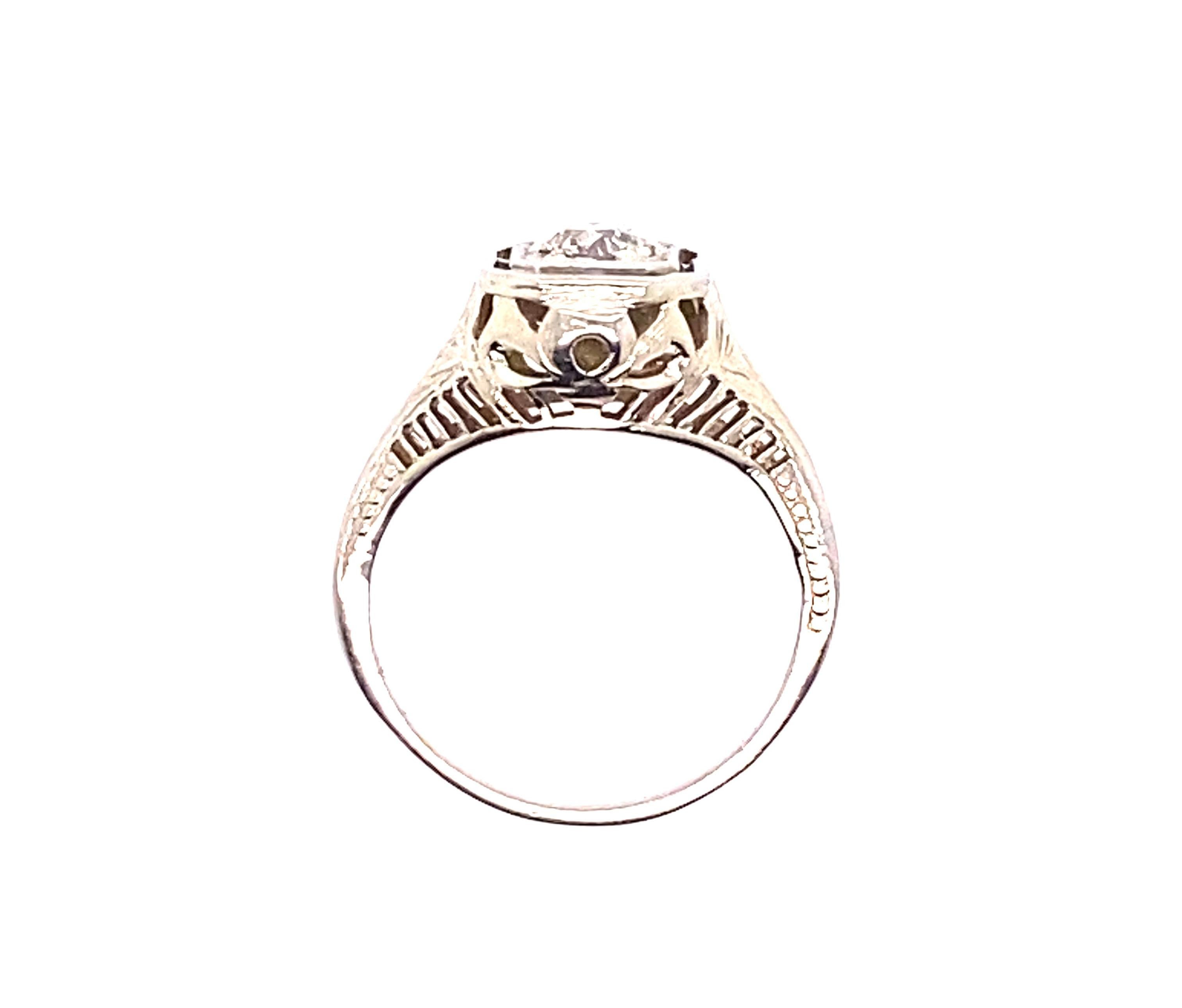 Genuine Original Art Deco Antique from 1910's -1920's Solitaire Engagement Ring .22ct Old European Cut Diamond 18K 


Featuring a Gorgeous Genuine .22ct Natural Mined Old European Cut Diamond Center

Culminating on Top with the Original Bright White
