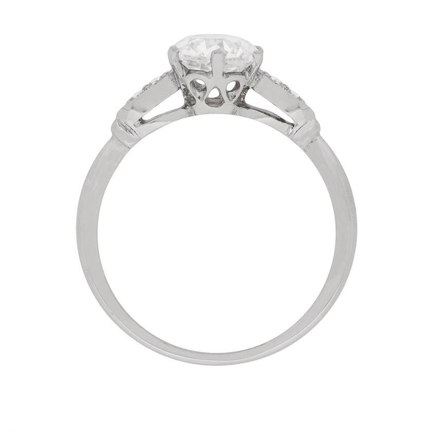 This beautiful engagement ring features a 1.21 carat hand cut, old cut diamond. It weighs 1.21 carat and has been certified by an independent certification company as a H in colour and VS2 in clarity, typical of this era. It dates to around the