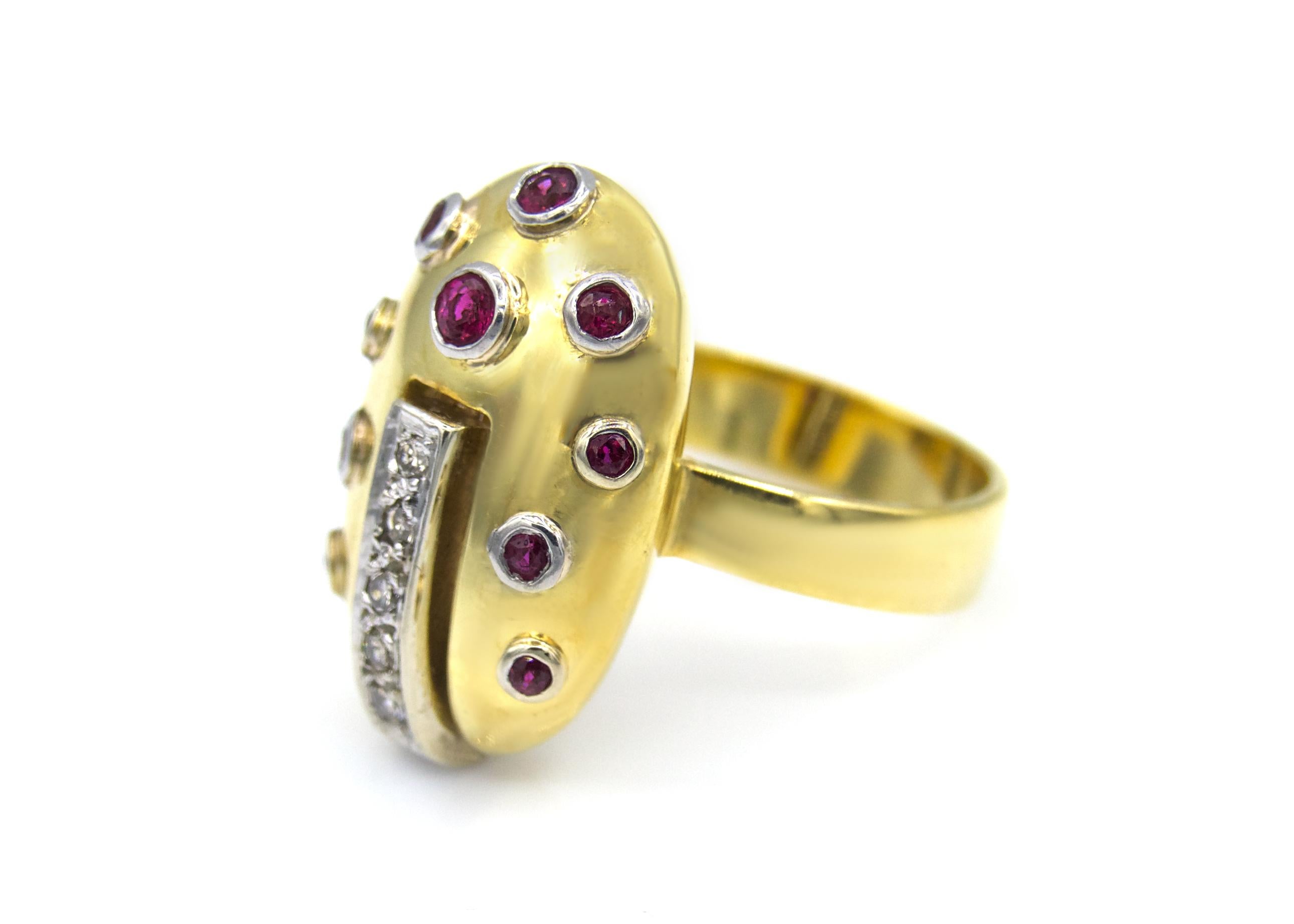 This 18 karat yellow gold domed cocktail ring is an original Ben Moses design, upcycled in the 1990's with the 10 cabochon rubies set in a white gold bezel and diamond strip added.

Size 6.5

7.6 g 

 

