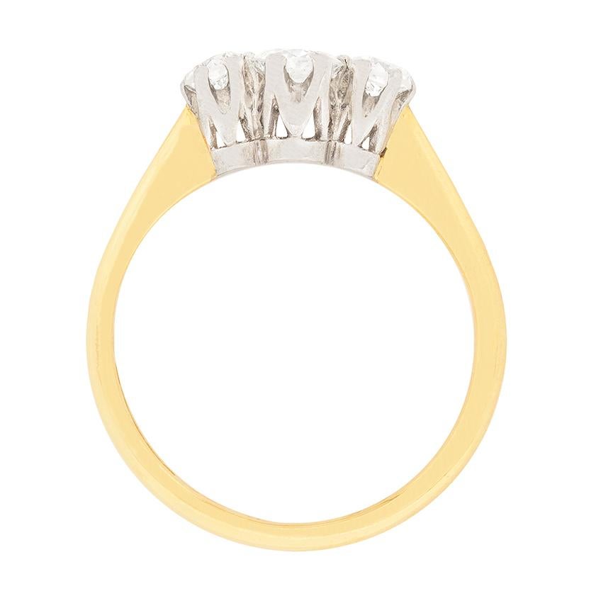 This three stone ring is a collection of old cut diamonds, the centre weighs 0.40 carat and the two adjacent weigh 0.20 carat each. All the diamonds match in quality, estimated as H in colour and SI in clarity. The setting work has been made from