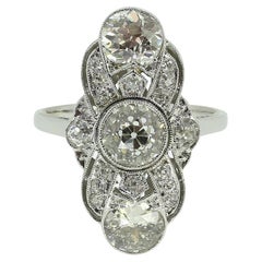 Anillo Art Decó de diamantes y tres piedras
