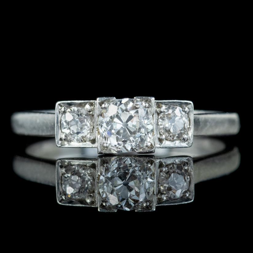 A stunning Art Deco trilogy ring from the 1920s adorned with three gorgeous old European cut diamonds with exceptional VS1 clarity – H colour. The largest is approx. 0.50ct in the centre with two 0.12ct diamonds on either side (approx. 0.75ct
