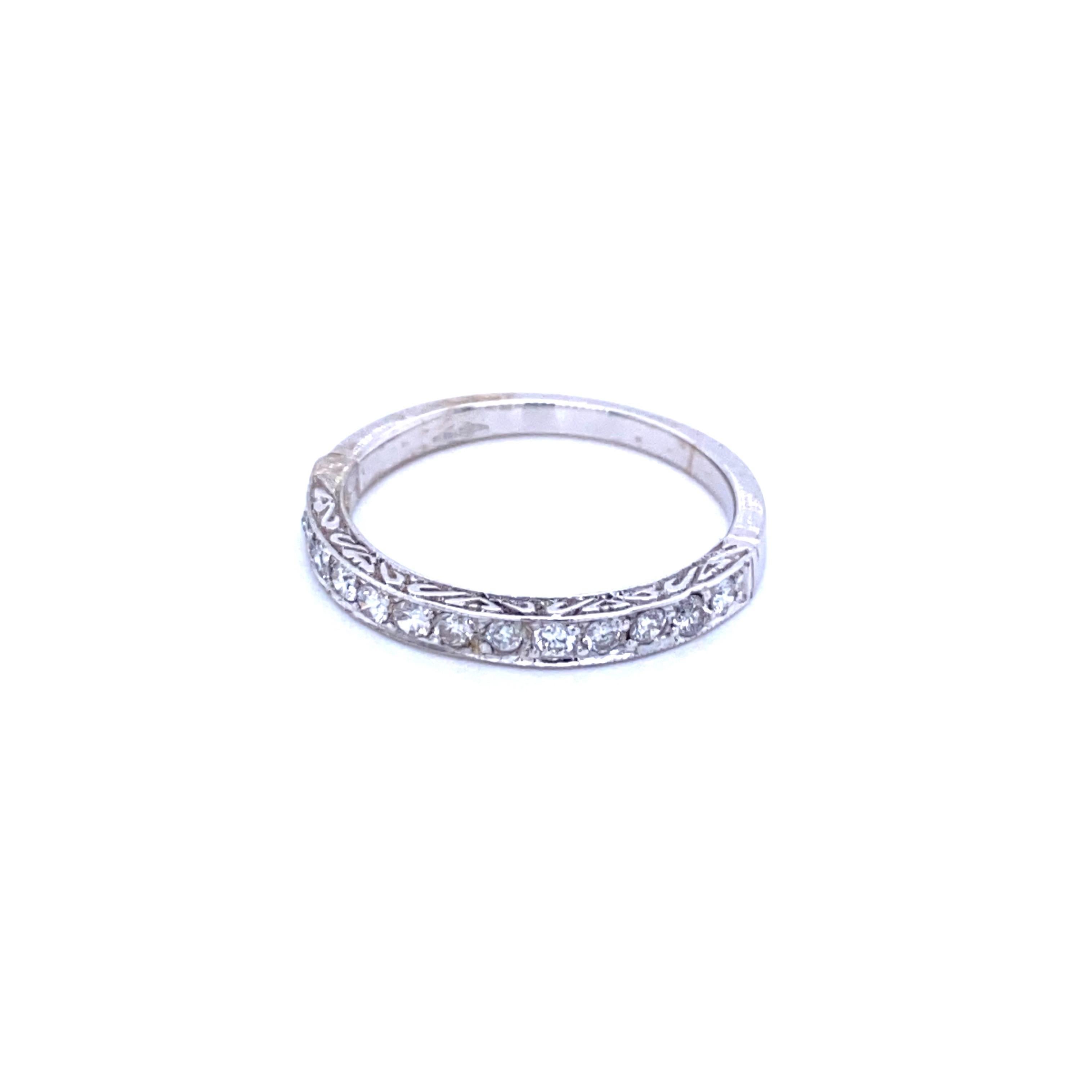 Diamond Half Eternity Band set in 18k gold. 13 Old Round cut diamonds are G color VVS2-VS2 . Carat weight = 0.35 ct. Total ring weight 2.2 grams.
Suitable with your engagement ring or alone.

CONDITION: Pre-Owned - Excellent 
METAL: 18k Gold
GEM